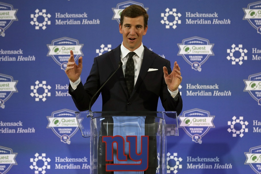 Eli Manning speaks to reporters
