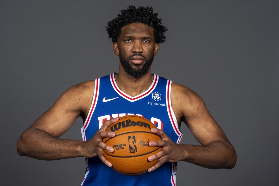Joel Embiid poses for a preseason picture.